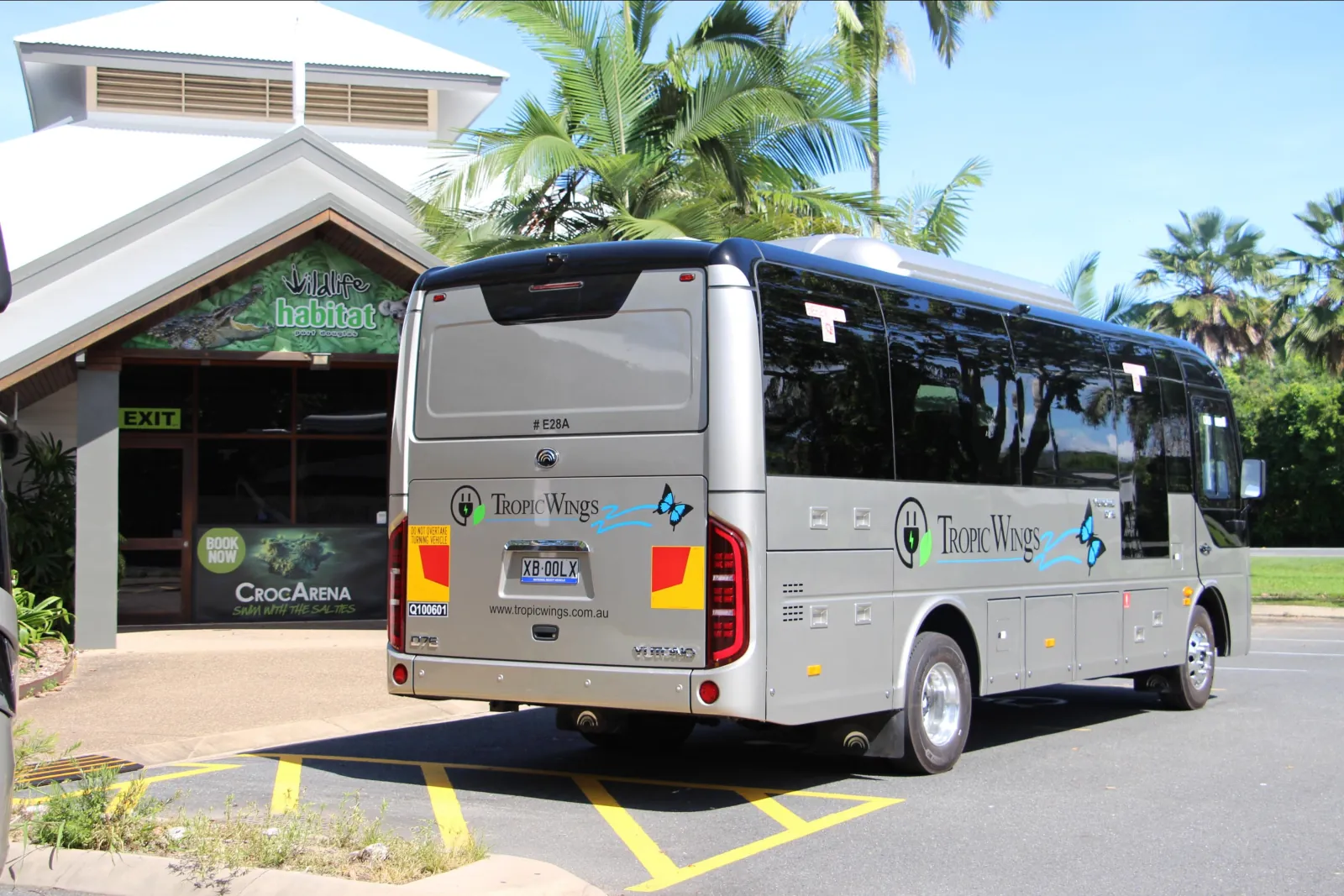 Electric tour bus outside a visitor centre
