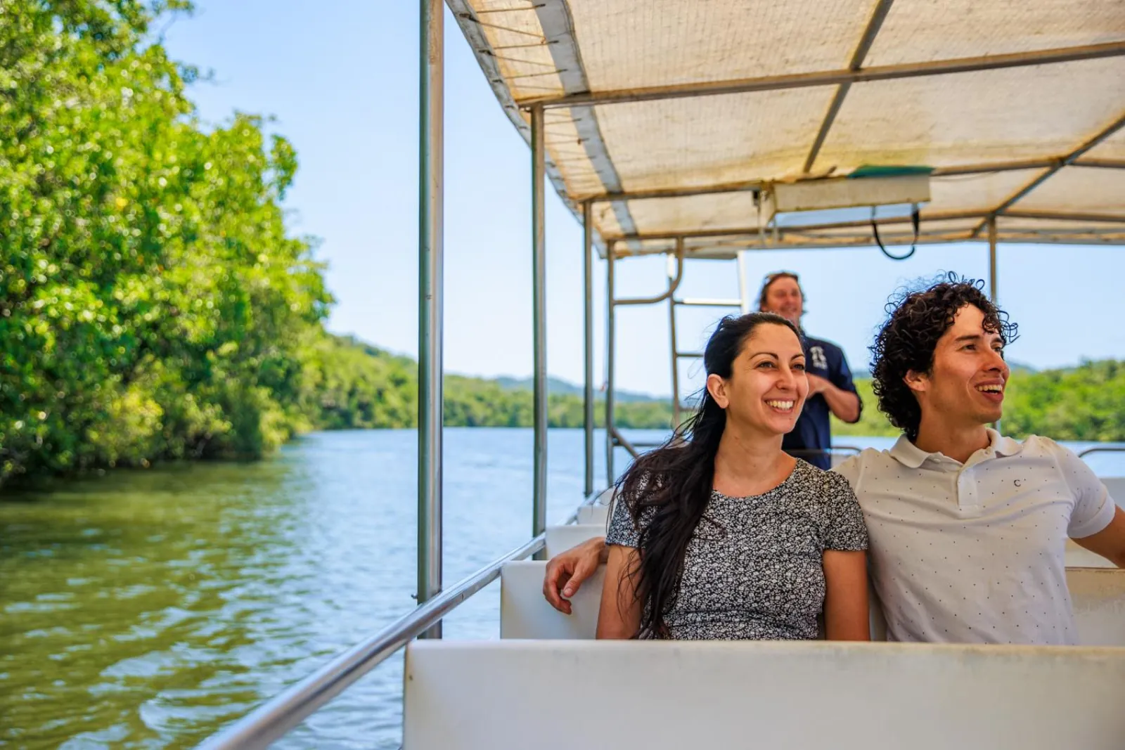 Couple smiling on a Daintree River cruise boat